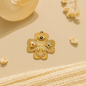 18K gold plated stainless steel four-leaf clover pendant with shell and multi-symbol charms