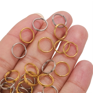 Macro view of gold and silver double-layered stainless steel split rings for DIY jewelry