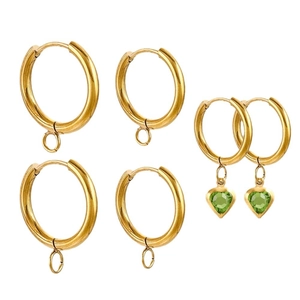 Golden DIY earring kit with loop and green heart-shaped crystal pendants on white background