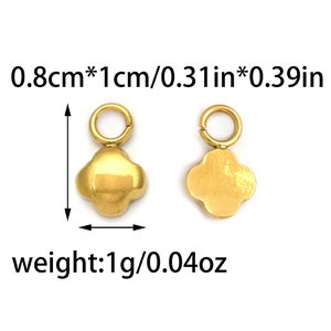 Detailed view of gold clover pendants with measurements of 0.8cm x 1cm and 1g weight