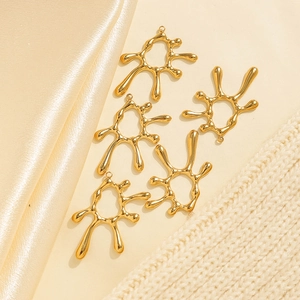Detailed macro view of five irregular sunburst golden 304 stainless steel pendants