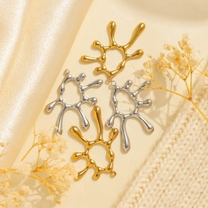 Abstract irregular sun pendant in gold and silver finish with high polished surface