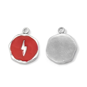 Macro detail of a 304 stainless steel round pendant with red enamel lightning design