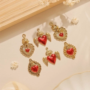 Baroque style sacred heart wing charms with red oil drip finish for jewelry making