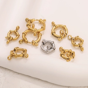 Macro view of gold and silver stainless steel spring ring clasps for DIY jewelry