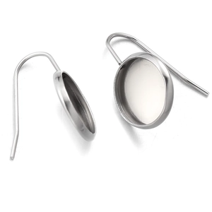 Detail of silver stainless steel U-shaped ear hooks with round bezel tray for DIY jewelry