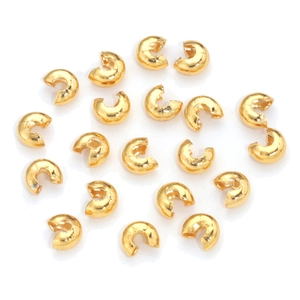 Detailed view of 18K gold plated open crescent crimp covers for bracelet making