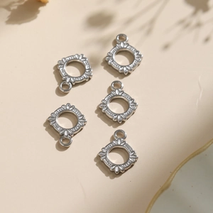 304 Stainless steel geometric round pendants with embossed floral texture for DIY jewelry