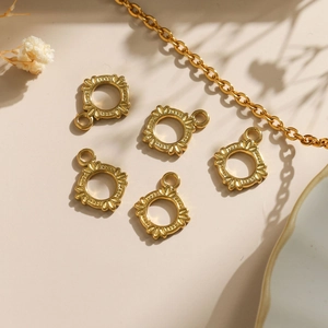 Five-piece set of gold 304 stainless steel sunburst hollow pendants for DIY jewelry making