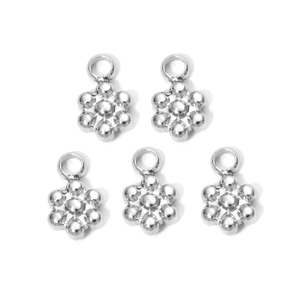 Detailed view of 5 silver stainless steel flower charms for DIY jewelry making