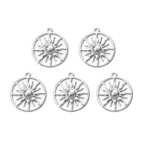 Set of five polished stainless steel sunburst pendants with a minimalist hollow design