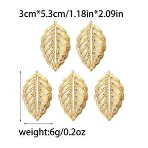 Golden stainless steel leaf pendants with hollow texture design and dimensions shown