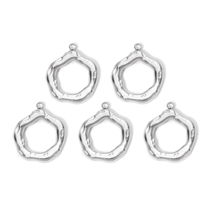 Detail of 5-piece hammered stainless steel round pendants for DIY jewelry making