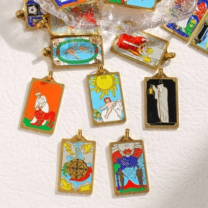 Close-up of vintage enamel Tarot card pendants in colorful 304 stainless steel designs