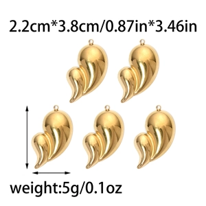 Macro view of five irregular wavy heart pendants in polished gold stainless steel