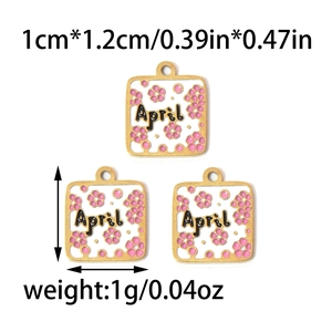 Detailed view of April birthstone flower pendants made of gold-plated stainless steel
