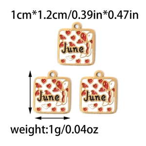 Detailed view of square June birthstone charm with white enamel and red heart details