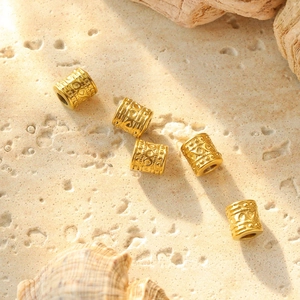 Vijf goudvergulde roestvrijstalen kralen met 8-patroon voor DIY sieraden maken
