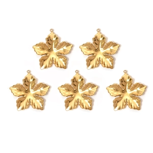 Five gold stainless steel flower charms with textured geometric lines for DIY jewelry making