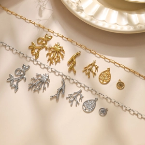 304 stainless steel coral leaf and tree of life pendants in gold and silver finishes