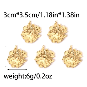 Detailed view of irregular 304 stainless steel gold flower pendants for jewelry making
