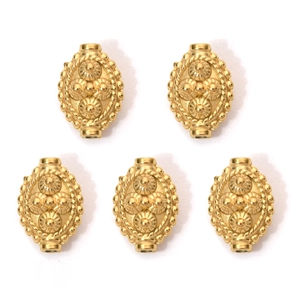 Five gold-plated geometric oval beads with embossed patterns and holes for jewelry making