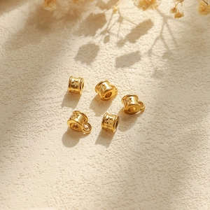 Vijf gouden roestvrijstalen stervormige cilinderkralen voor doe-het-zelf sieraden