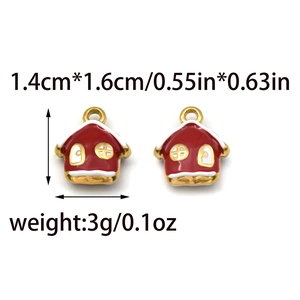 Macro view of red enamel house pendant with gold trim showing dimensions and weight