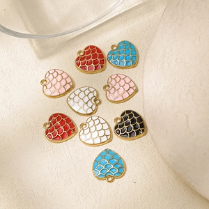 Colorful heart-shaped stainless steel charms with fish scale texture and enamel finish
