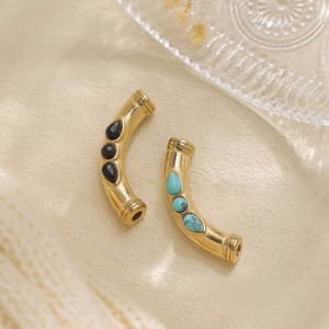 Detail of 304 stainless steel pendants with inset teardrop natural stones for jewelry DIY