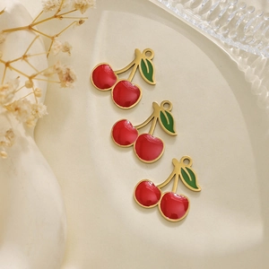 Detailed view of red cherry charms made of 304 stainless steel for DIY jewelry making