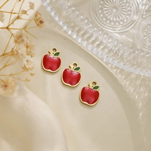 Three red apple-shaped charms made of 304 stainless steel with green leaf details