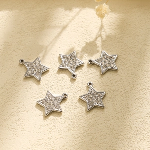 Set de cinco colgantes de estrella plateados con diamantes de imitación para joyas DIY