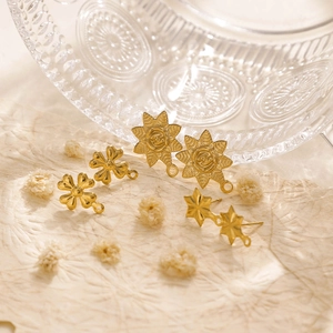 Detailed macro view of 304 stainless steel gold floral and geometric earring DIY components