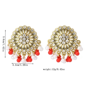 Bohemian round earrings with white crystals and colorful red and white beaded tassels