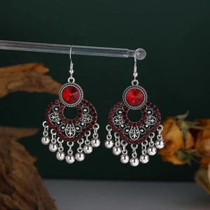 Bohemian silver dangle earrings with red gemstones and metallic bead tassels