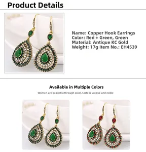 Detail view of vintage bohemian teardrop earrings with crystal rhinestones in gold