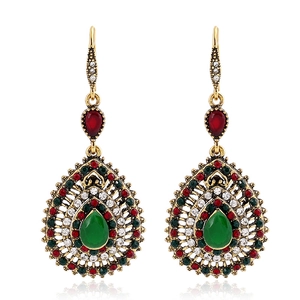 Vintage bohemian drop earrings with green pear-shaped crystals and red rhinestones