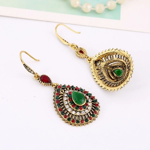 Vintage bohemian waterdrop earrings with colorful crystals and green stones in gold finish