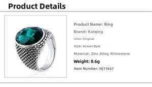 Detailed macro view of men's silver ring with large green crystal and scale texture