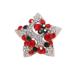 Broche vintage étoile et lune avec cristaux colorés sur une base en métal argenté