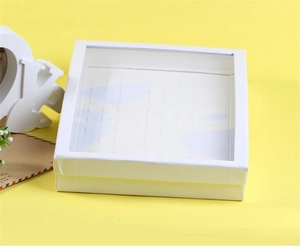 Boîte à bijoux blanche avec fenêtre transparente et 100 fentes pour bagues et cadeaux