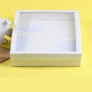 Écrin blanc 100 emplacements avec fenêtre transparente pour bagues et broches