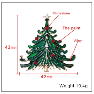 Detailed view of 43mm Christmas tree brooch with green enamel and sparkling rhinestones