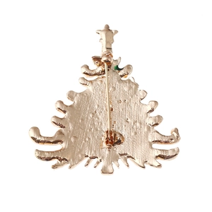 Back view of light gold metal Christmas tree brooch with safety pin and secure clasp