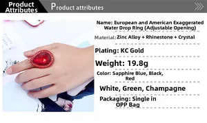 Detailed close-up of a large red pear-shaped crystal ring with KC gold plating