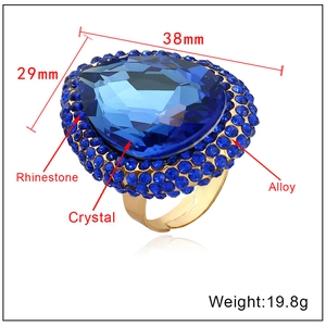 Detail view of large blue crystal ring with 38mm x 29mm dimensions and weight specs