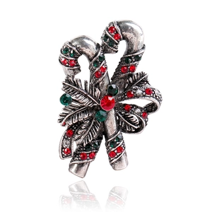 Vintage Christmas brooch with crossed candy canes, red and green rhinestones on silver