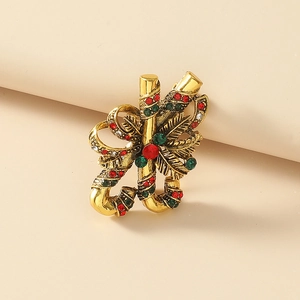 Vintage gold-plated Christmas candy cane brooch with red green and white rhinestones