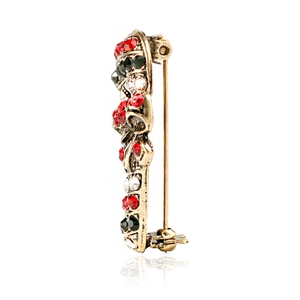 Vintage Christmas candy cane brooch with red and green crystals on antique gold alloy